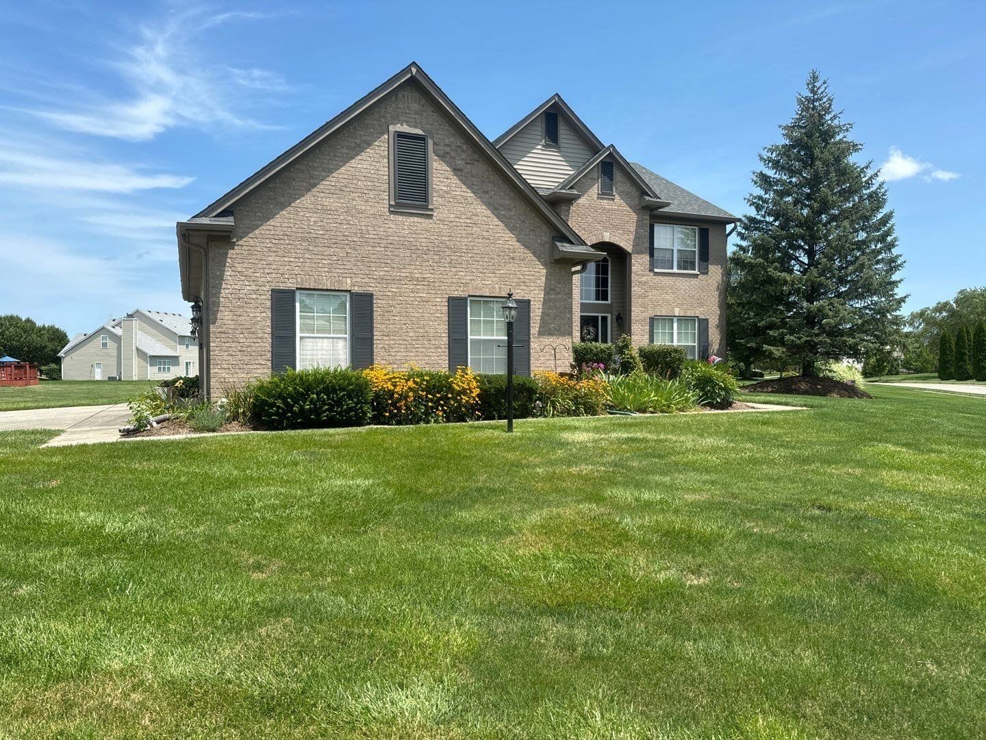 Brick and siding home on the north side of Indianapolis after exterior cleaning