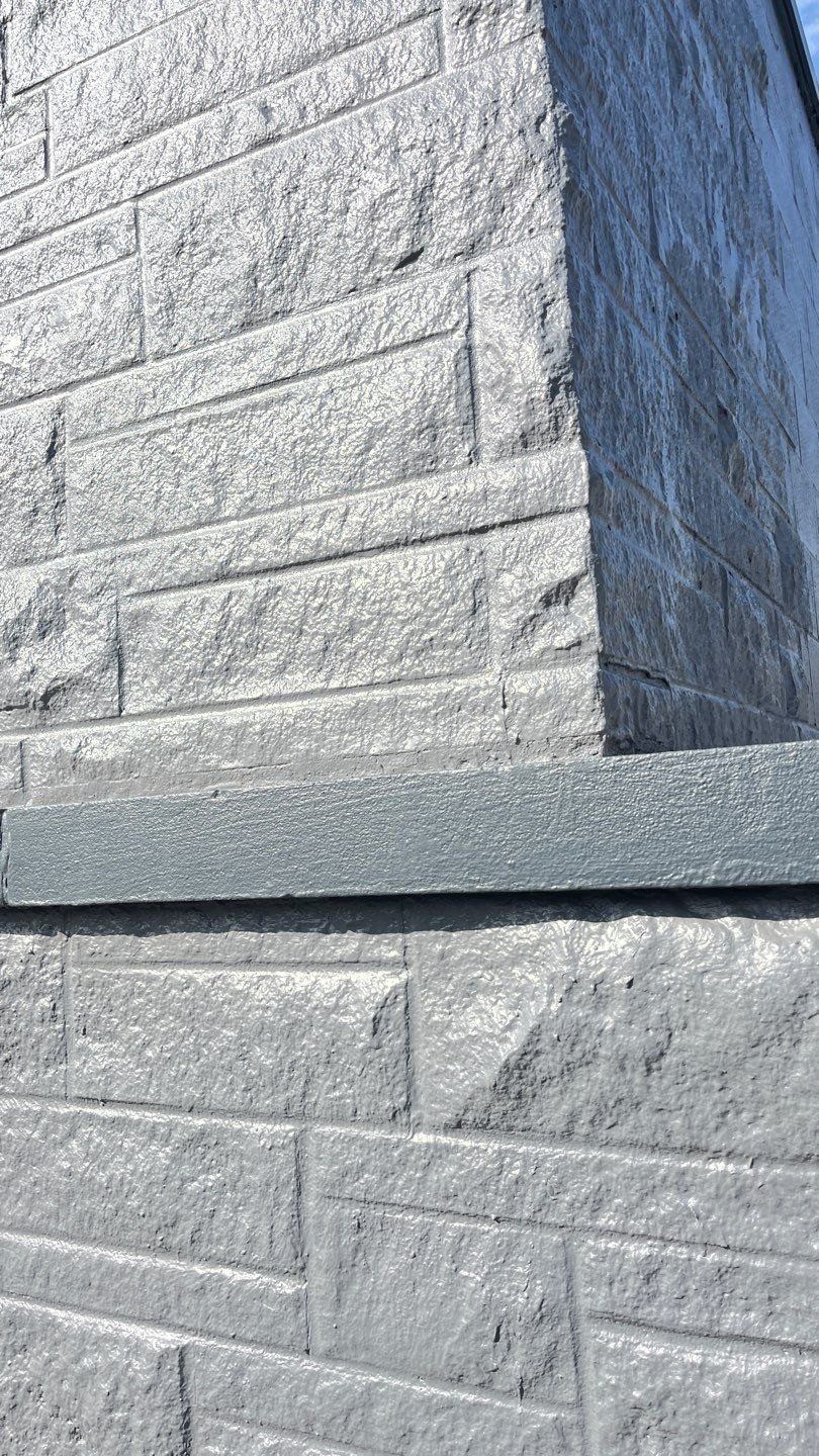 Cut limestone block wall after masonry cleaning in Anderson