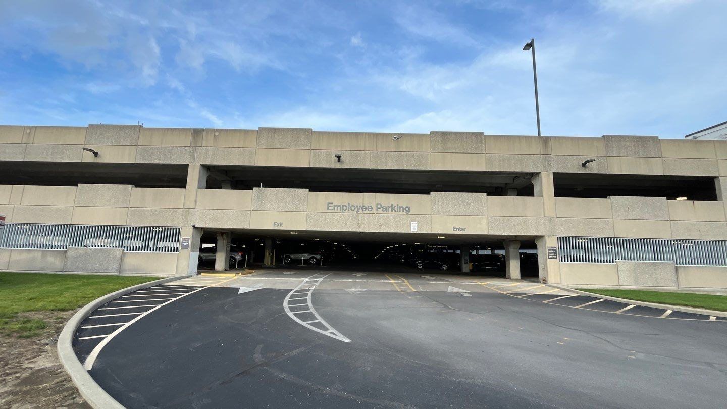 Cleaned concrete parking structure and approach lane at an Indianapolis property